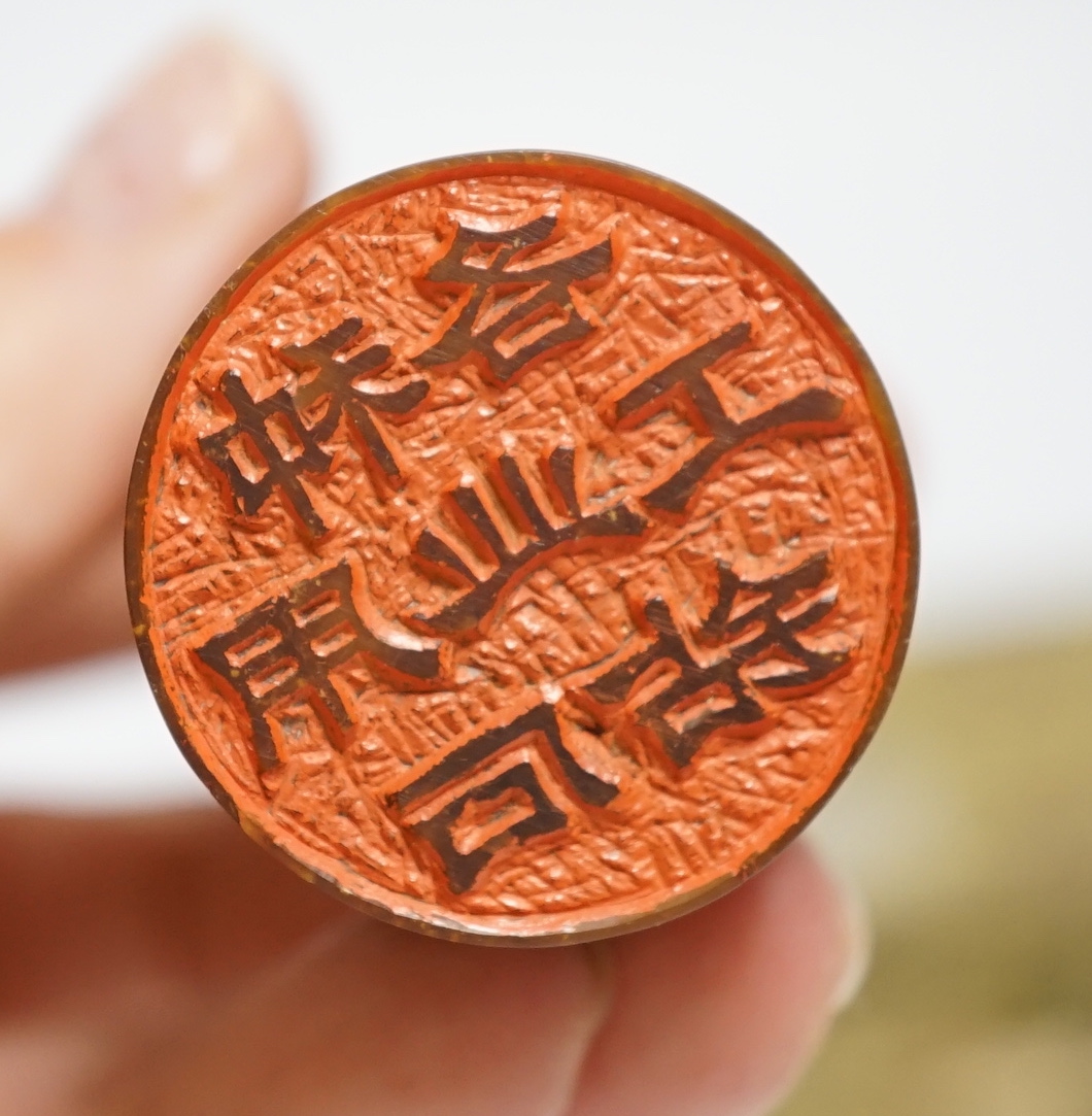 A large Chinese soapstone 'dragon' seal and a smaller seal, cased (2), tallest 20cm